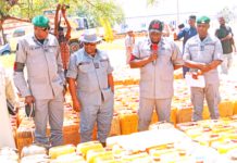 National coordinator of operation whirlwind, inspecting seized PMS at Customs house Yola on Wednesday.