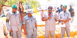 National coordinator of operation whirlwind, inspecting seized PMS at Customs house Yola on Wednesday.